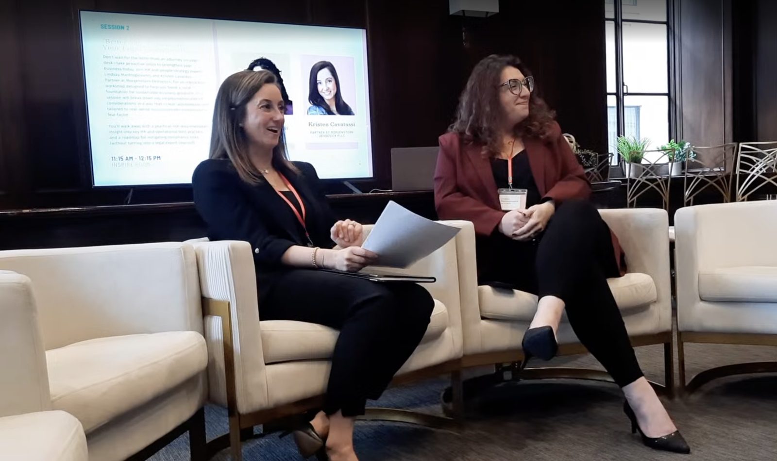 Lindsay Mastro seated beside attorney Kristen Cavatassi during a fireside session