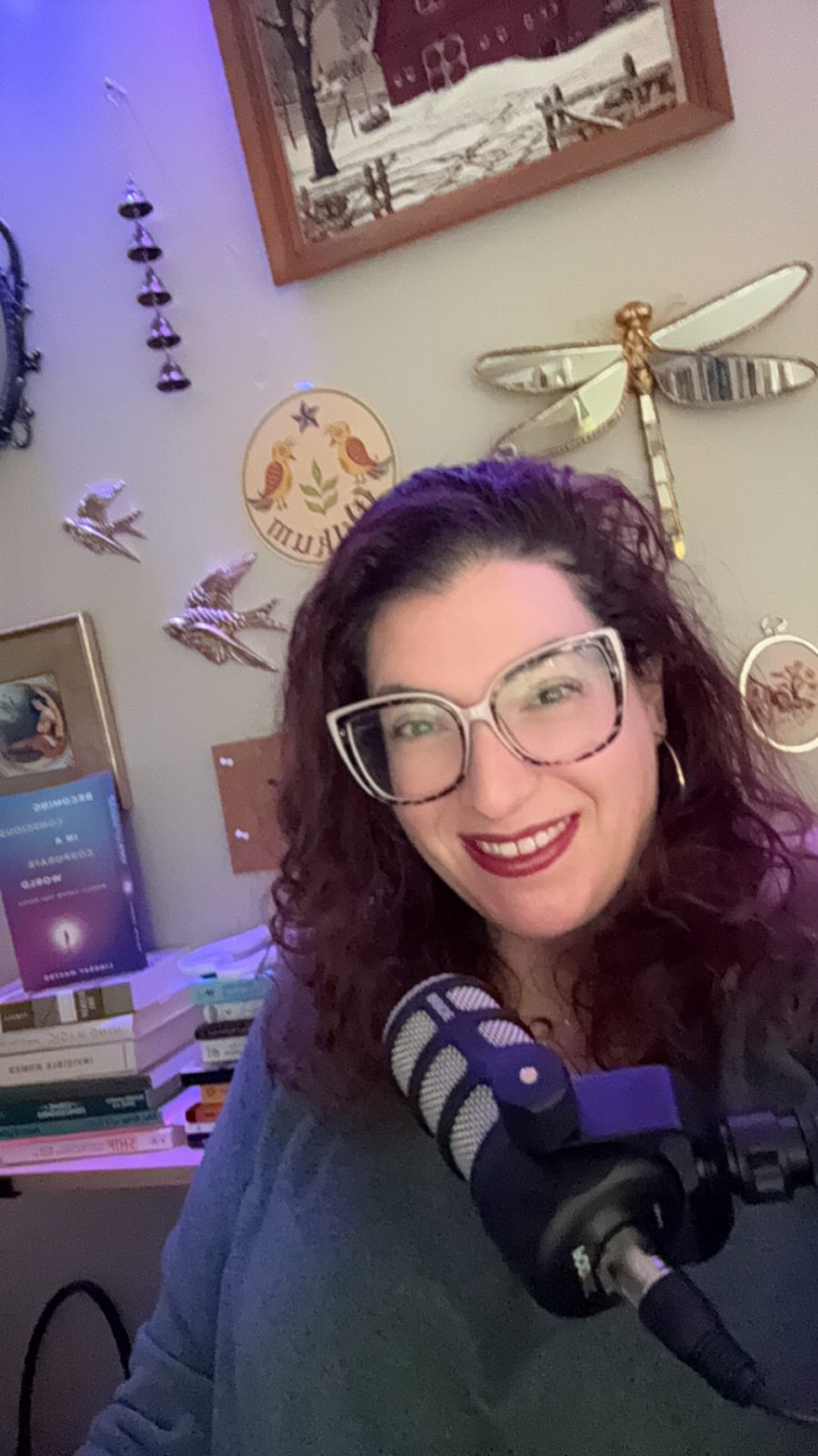 Lindsay Mastro at her podcast microphone
